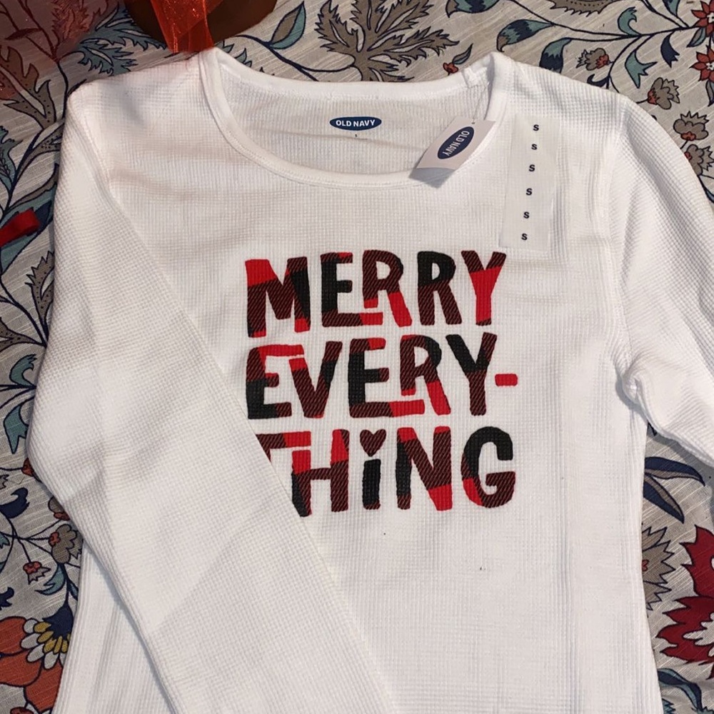 White long sleeve with plaid writing